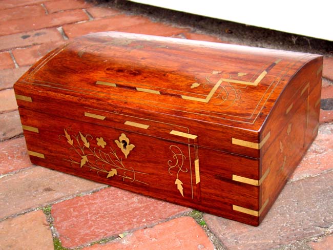 A fabulous 19th century brass inlaid rosewood dome top jewelry box circa 1875